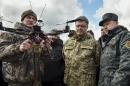 Ukraine's President Poroshenko and Ukrainian secretary to the National Security and Defence Council Turchynov visit the training center of the Ukrainian National Guard outside Kiev