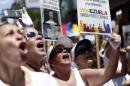 Opposition supporters shout during a rally against the government of Venezuela's President Maduro, and in support of the political leaders in prison, in Caracas