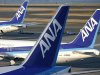 Aircraft of ANA sit parked at Haneda airport in Tokyo