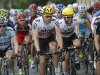 Levi Leipheimer of the US, left, Cadel Evans of Australia, second left rear, Edvald Boasson Hagen of Norway, center, and Mark Cavendish of Britain, second right, ride in the pack during the third stage of the Tour de France cycling race over 197 kilometers (122.4 miles) with start in Orchies and finish in Boulogne-sur-Mer, northern France, Tuesday July 3, 2012. (AP Photo/Laurent Cipriani)