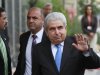 Cyprus' President Dimitris Christofias waves to the media as he arrives at the center for the Informal European Integrated Maritime policy in Limassol, Cyprus, Monday, Oct. 8, 2012. (AP Photo/Petros Karadjias)