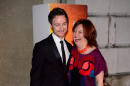 British actor James McAvoy and BFI London Film Festival Director, Clare Stewart arrive for the London Film Festival Awards Ceremony, at a central London venue, London, Saturday, Oct. 18, 2014. (Photo by Jonathan Short/Invision/AP)