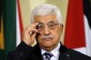 Palestinian President Mahmoud Abbas listens to a question during a media briefing at the Union Building in Pretoria