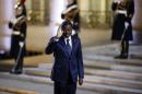 President of Togo Gnassingbe arrives for a dinner with the French President and other dignitaries as part of the Summit for Peace and Security in Africa at the Elysee Palace in Paris