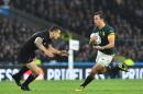 South Africa's fly half Handre Pollard (R) runs to evade New Zealand's centre Sonny Bill Williams during a semi-final match of the 2015 Rugby World Cup at Twickenham Stadium, southwest London, on October 24, 2015