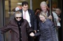 U.S. Secretary of State Hillary Clinton leaves New York Presbyterian Hospital with husband, Bill, and daughter, Chelsea, in New York