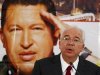 Venezuela's Energy Minister Rafael Ramirez talks to the media in front of a giant picture of Venezuela's President Hugo Chavez during a news conference at the headquarters of the state-run oil company PDVSA in Caracas