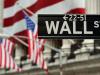 The Wall Street sign near the front of the New York Stock Exchange is viewed on August 5, 2011