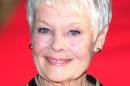 Dame Judi Dench admits she will miss James Bond