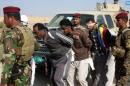 Iraqi Officials: IS Extremists Line Up, Kill 50