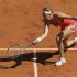 Azarenka of Belarus returns the ball to Pfizenmaier of Germany during the French Open tennis tournament at the Roland Garros stadium in Paris