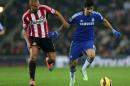 Chelsea's Brazilian-born Spanish striker Diego Costa (R) vies with Sunderland's English defender Wes Brown during their English Premier League football match in Sunderland, England on November 29, 2014