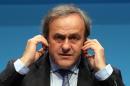 FILE - In this March 24, 2015 file photo UEFA President Michel Platini speaks during a news conference at the end of the 39th Ordinary UEFA Congress in Vienna, Austria. On Thursday, Oct. 8, 2015 file photo FIFA provisionally banned UEFA President Michel Platini for 90 days.(AP Photo/Ronald Zak, file)