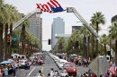 A motorcade of hearses carrying the remains of members of the Granite Mountain Hotshots firefighting team, who were killed fighting the Yarnell Fire, departs from Maricopa County Medical Examiner's office in Phoenix