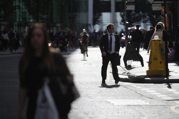 City workers make their way home as the financial markets face uncertainty in the wake of Brexit on June 27, 2016 in London, England. (Christopher Fur...