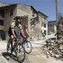 Itlay's former rider and World champion Cipollini with Lampre rider Gasparotto visit San Gregorio village near L'Aquila