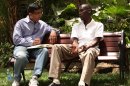 This publicity image released by Rocky Mountain Pictures, shows an undated film clip of director, Dinesh D'Souza, interviewing George Obama in "2016: Obama's America." Despite the unconventional release of "2016: Obama's America," the movie is among the most successful political documentaries of all time and it doesn't show signs of cooling down ahead of the presidential election. (AP Photo/Rocky Mountain Pictures)