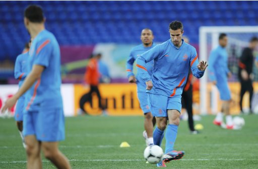 Netherland's van Persie kicks a ball during a training session during the Euro 2012 at Metalist stadium in Kharkiv