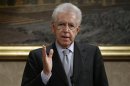 Italy's outgoing Prime Minister Mario Monti gestures during a news conference in Rome