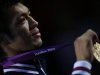 Japan's Ryota Murata shows his gold medal during the presentation ceremony after the Men's Middle (75kg) gold medal boxing match at the London Olympics