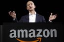 Jeff Bezos, CEO and founder of Amazon, speaks at the introduction of the new Amazon Kindle Fire HD and Kindle Paperwhite in Santa Monica, Calif., Thursday, Sept. 6, 2012. (AP Photo/Reed Saxon)