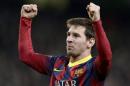 Barcelona's Lionel Messi celebrates after scoring a penalty against Manchester City during their Champions League round of 16 first leg soccer match at the Etihad Stadium in Manchester