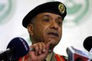 Interior Ministry spokesman Mansour Turki gestures during a news conference in Riyadh