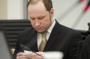 FILE This Tuesday May, 29, 2012 file photo shows confessed mass-murderer Anders Behring Breivik looking at this own notes as he sits inside court as the trial against him continues in Oslo, Norway. Breivik, who is serving a 21-year sentence for killing 77 people in a bomb and gun rampage last year, has complained that he is being held in inhumane conditions and is being denied freedom of expression, his lawyer said Friday Nov. 9, 2012. "He has written a long complaint that he is being held in a section with particularly high security," Tord Jordet told The Associated Press. "He is today the only one in this ward and the security regime is the strictest in Norway." (AP Photo / Heiko Junge, NTB scanpix, file) NORWAY OUT