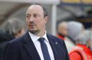 Napoli coach Rafa Benitez stands on the pitch prior to the start of a Serie A soccer match against Hellas Verona at Bentegodi stadium in Verona, Italy, Sunday, March 15, 2015. (AP Photo/Felice Calabro')