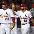 St. Louis Cardinals' Carpenter and Freese celebrate with their teammates after defeating the San Francisco Giants in Game 3 of their MLB NLCS playoff baseball series in St. Louis