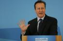 Britain's Prime Minister David Cameron gestures as he delivers a speech in Hastings