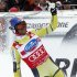 World Cup overall points leader Aksel Lund Svindal of Norway celebrates after crossing the finish line to win in the men's World Cup Super-G race in Val Gardena