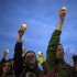 Mourners raise candles for Boston Marathon bomb victims in Cambridge, Massachusetts