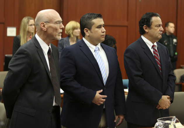 Attorney Don West, left, and jury consultant Robert Hirschhorn, right, stand with George Zimmerman as potential jurors enter the courtroom for Zimmerman's trial in Seminole circuit court in Sanford, Fla., Thursday, June 20, 2013. Zimmerman has been charged with second-degree murder for the 2012 shooting death of Trayvon Martin.(AP Photo/Orlando Sentinel, Gary Green, Pool)