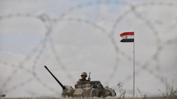 Egyptian soldier keeps guard on the border between Egypt and southern Gaza Strip