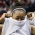 Baylor guard Odyssey Sims cries while leaving the court following an 82-81 loss to Louisville in a regional semifinal in the women's NCAA college basketball tournament in Oklahoma City, Sunday, March 31, 2013. (AP Photo/Sue Ogrocki)