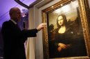 Professor Vezzosi Director of the Museo Ideale Leonardo da Vinci points to details on a painting attributed to Leonardo da Vinci and representing Mona Lisa during a presentation in Geneva