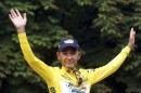 File photo of Tour de France winner Pantani of Italy raising his arms in Paris