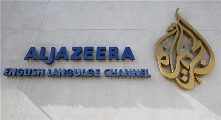 صحافة قناة الجزيرة تمثل امام المحكمة 2014-01-29T215934Z_1_ACAEA0S1P3G00_RTROPTP_2_OEGTP-EGY-JAZEERA-MM5
