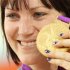 Australia's Anna Meares holds up her gold medal after the track cycling women's sprint finals at the Velodrome during the London 2012 Olympic Games