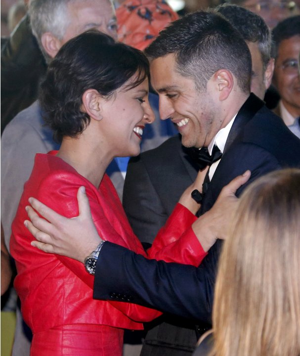 Bruno Boileau hugs  Vallaud-Belkacem, French Minister for Women's Rights and Government Spokesperson after getting married at the town hall in Montpellier