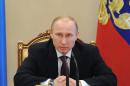 Russia's President Vladimir Putin chairs a Cabinet meeting in the Kremlin in Moscow, on April 30, 2014