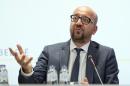 Belgian Prime Minister Charles Michel speaks during a media conference at the prime ministers office in Brussels on Sunday, Aug. 7, 2016. A man attacked two police officers with a machete near the police headquarters in Charleroi, Belgium on Saturday, Aug. 6, 2016 before being apprehended. (AP Photo/Virginia Mayo)