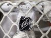 FILE - In this file photo taken Sept. 17, 2012, the NHL logo is seen on a goal at a Nashville Predators practice rink in Nashville, Tenn. The NHL eliminated 16 more days from the regular-season schedule Monday, Dec. 10, 2012, and if a deal with the players' association isn't reached soon the whole season could be lost. The league wiped out all games through Dec. 30 in its latest round of cancellations. Negotiations between the league and the players' association broke off last week, but NHL deputy commissioner Bill Daly said Sunday the sides are trying to restart talks this week. (AP Photo/Mark Humphrey, file)