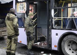 Pro-Russian rebels inspect a damaged trolleybus in&nbsp;&hellip;