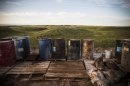 Barrels on the site of an oil derrick in the Bakken shale formation on July 23, 2013 outside Watford City, North Dakota
