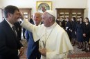 Pope Francis meets Hungary's President Janos Ader, during a private audience at the Vatican, Friday, Sept. 20, 2013. (AP Photo/Claudio Peri, Pool)