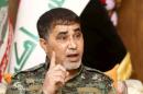 Military spokesman for Asaib Ahl al-Haq, Jawad al-Talabawi speaks during an interview with Reuters, in Baghdad
