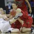 Connecticut forward Breanna Stewart (30) and Louisville guard Megan Deines (15) battle for a loose ball during first half of the national championship game of the women's Final Four of the NCAA college basketball tournament, Tuesday, April 9, 2013, in New Orleans. (AP Photo/Gerald Herbert)