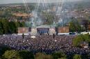 Leicester City fans gather to celebrate their team winning the English Premier League, in Victoria Park, Leicester, England, after the open top bus parade through the city centre, Monday May 16, 2016. (Tim Goode/PA via AP) UNITED KINGDOM OUT